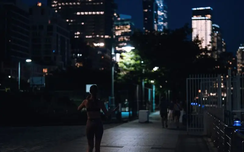 Runners participating in an urban night race