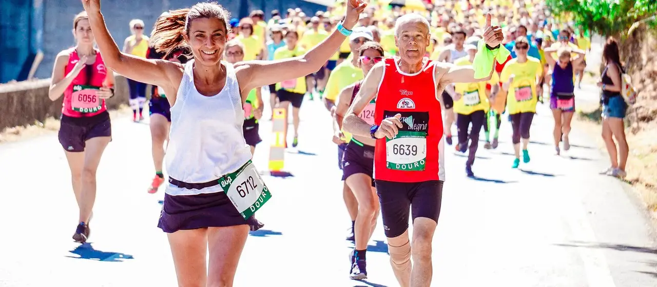 Corredores en una carrera popular — calendario de carreras de España 2026