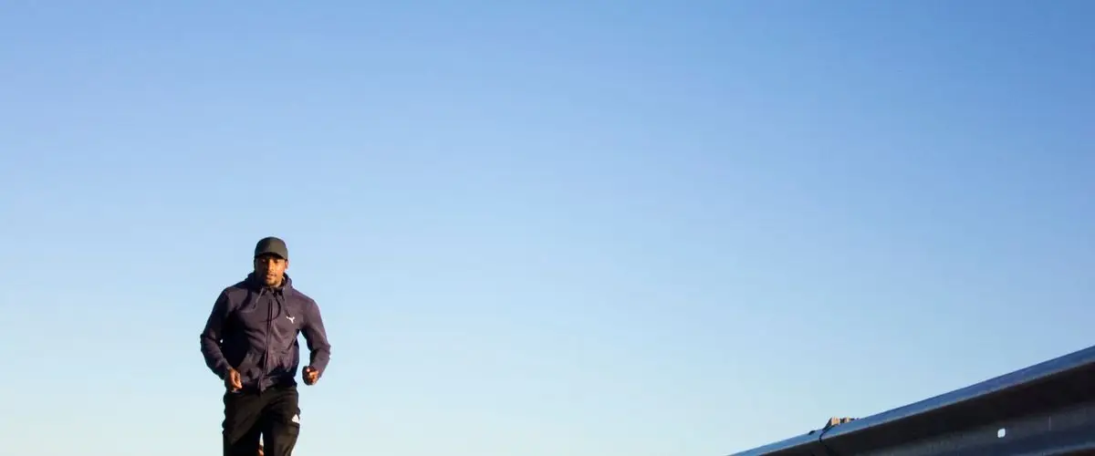 Runner doing speed intervals on an athletic track