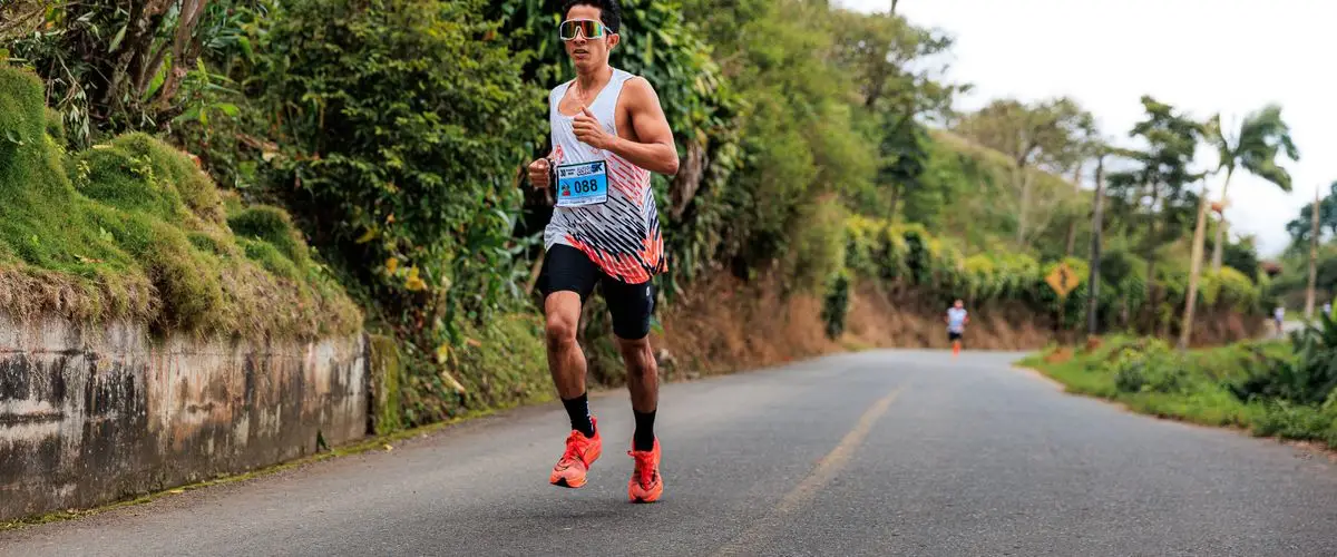 Athlete running long run on rural road