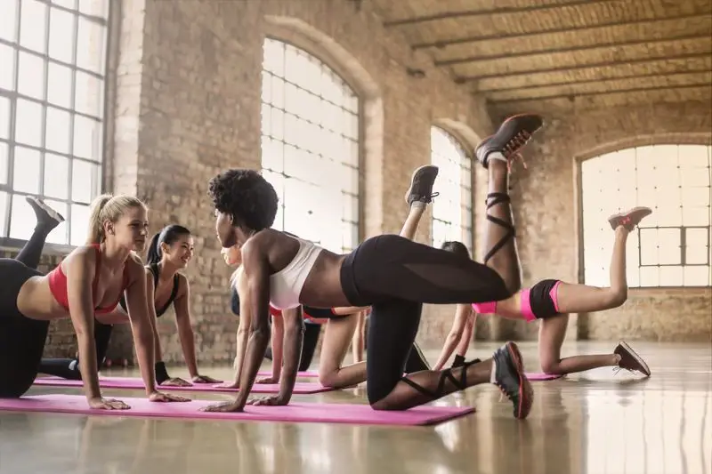 Runner performing core exercises on a mat